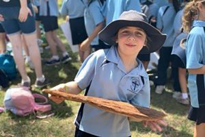 St Kevin's Catholic Primary School Eastwood - student holding a bat